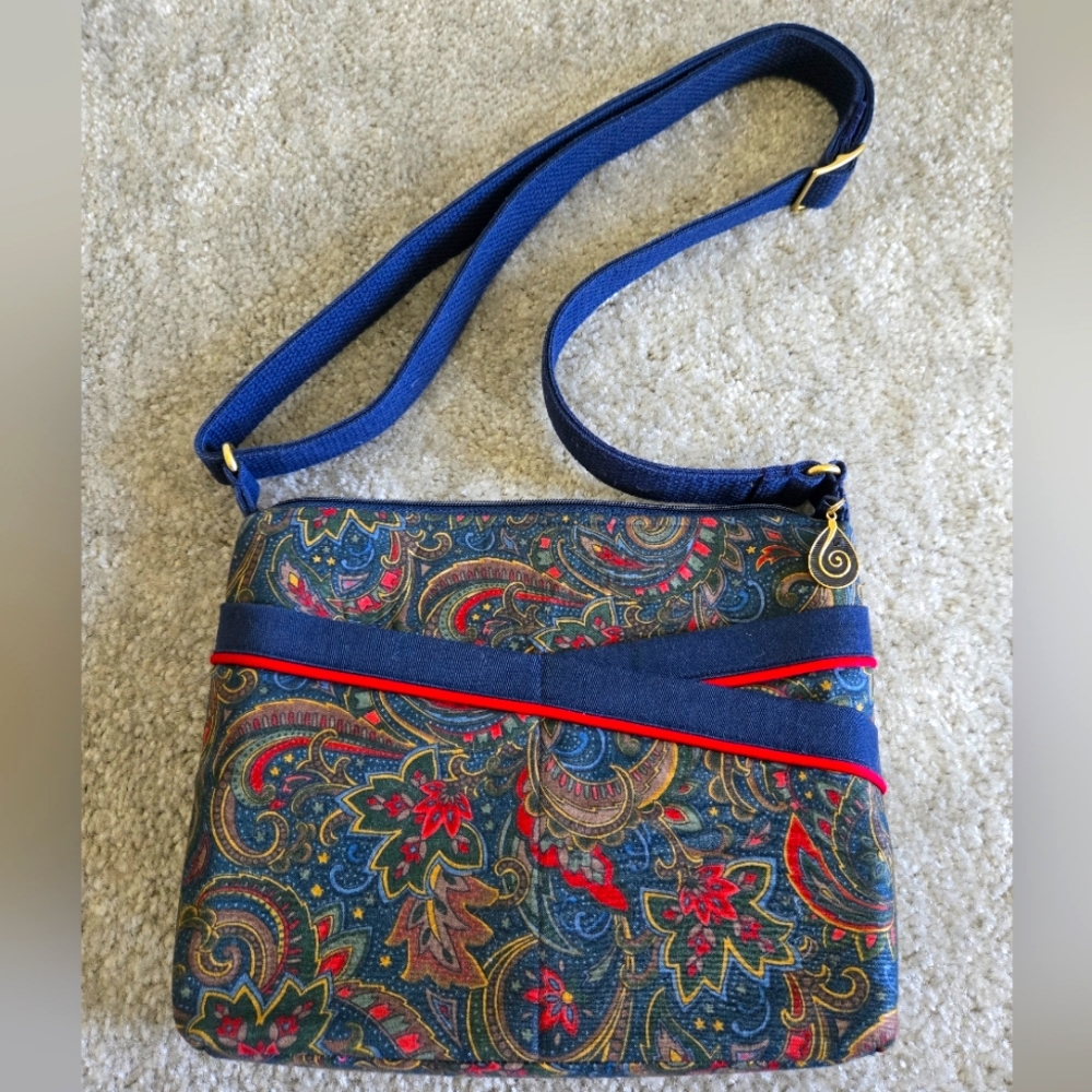 NEW Feather Stitches Crisscross Crossbody Bag with Blue and Red Accents
